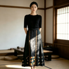 Luxury ink black floral jacquard mulberry silk horse-face skirt under soft dramatic lighting