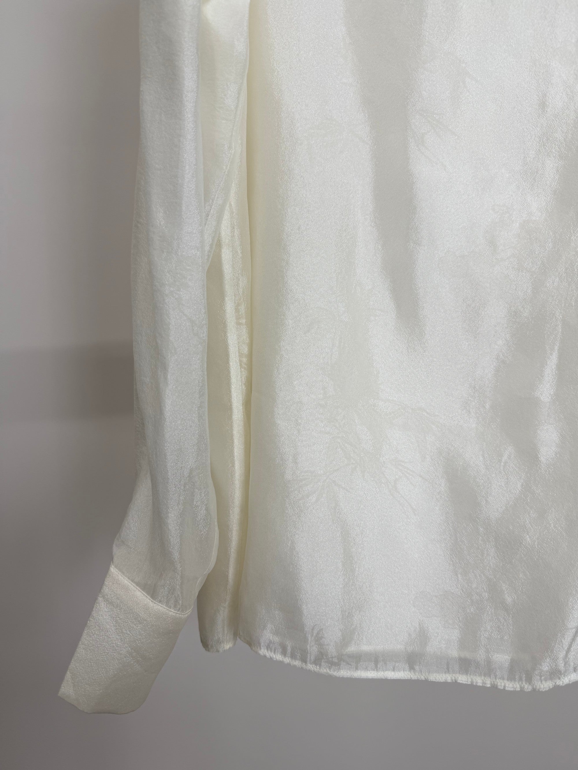 close-up to white bamboo jacquard rayon blouse stand collar modern chinese fashion luxe orienta