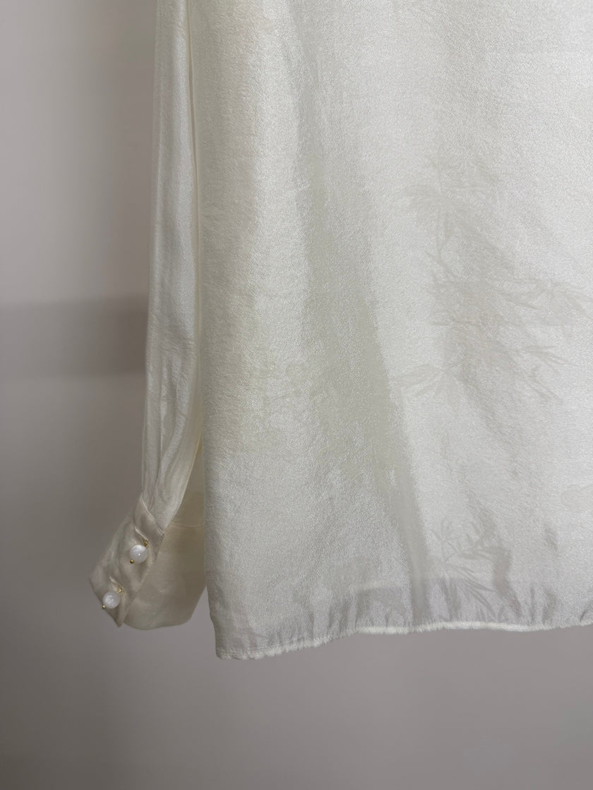 close-up to white bamboo jacquard rayon blouse stand collar modern chinese fashion luxe orienta