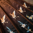 Embroidered fabric with butterflies and flowers for the ma mian skirt