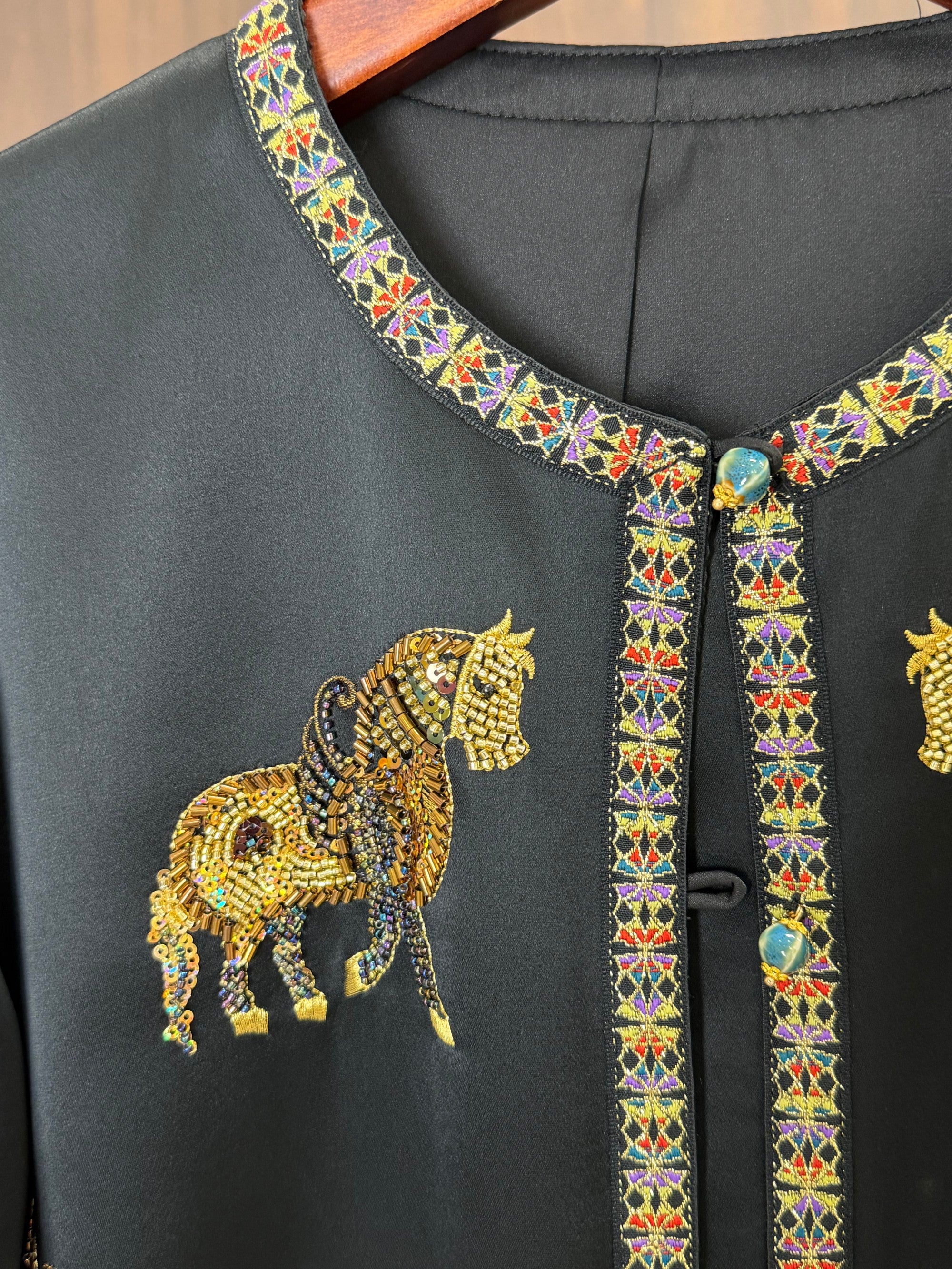 colorful geometric trim collar cuff oriental blouse detail