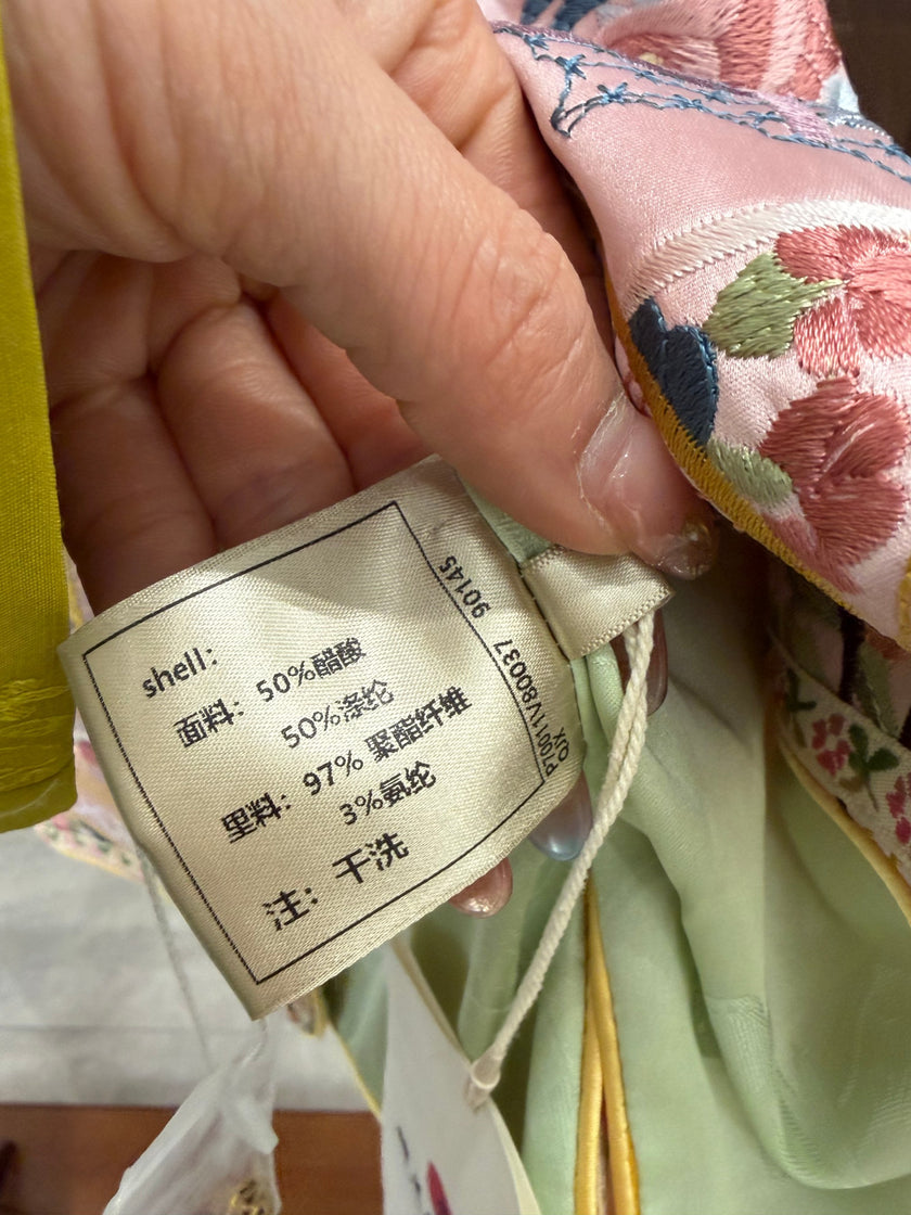 pink embroidered chinese vest women modern chinese fashion luxe orienta fabric composition