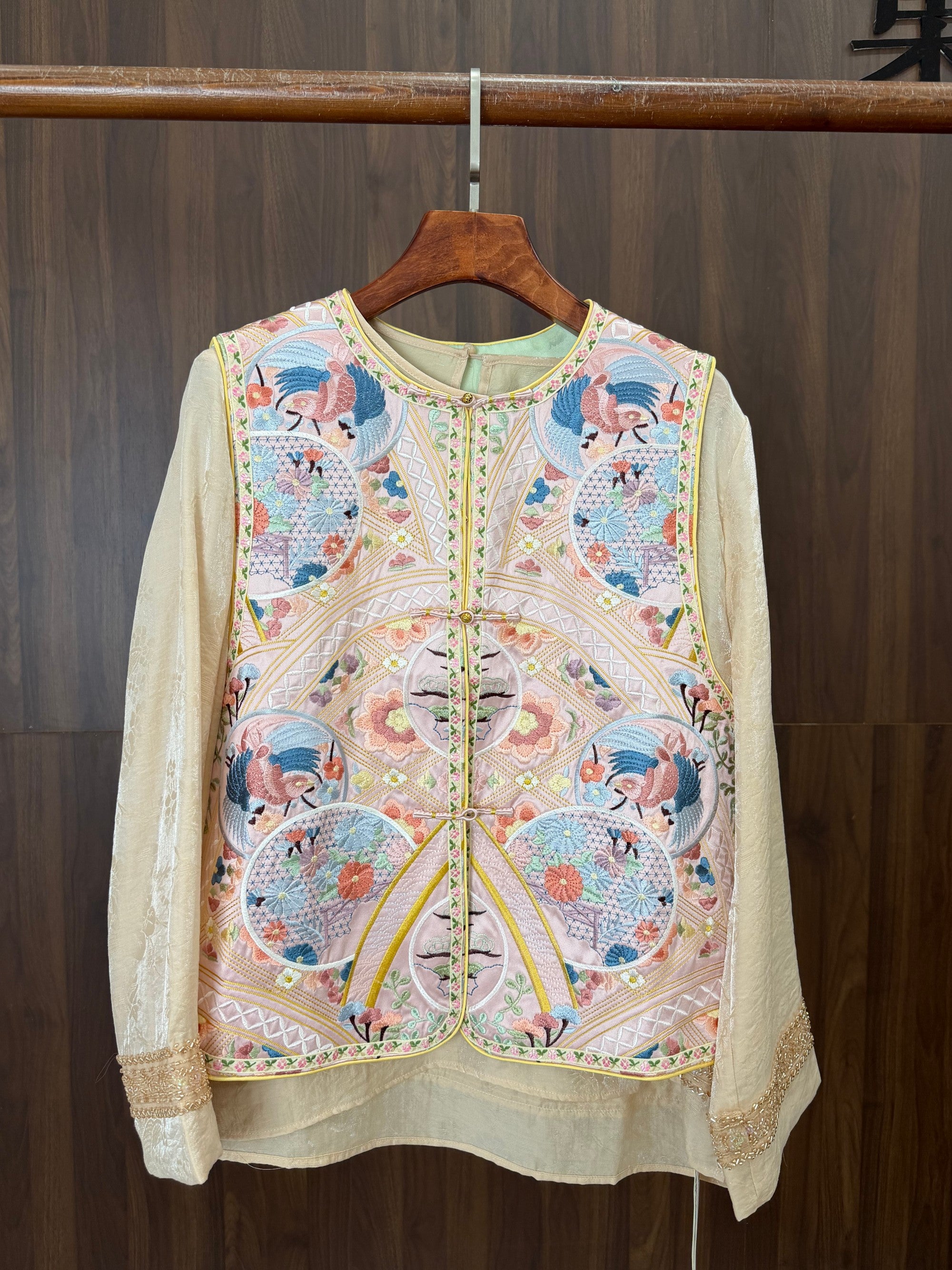 modern oriental fashion outfit styled with pink embroidered vest