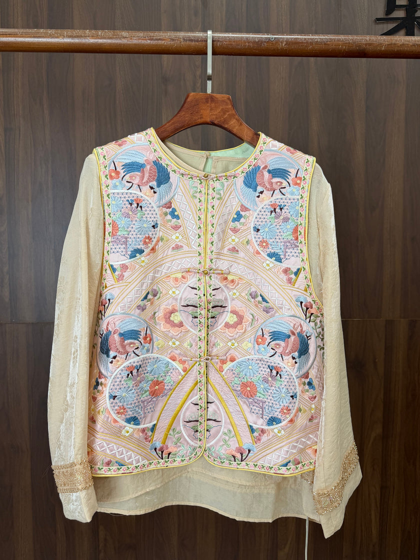 modern oriental fashion outfit styled with pink embroidered vest