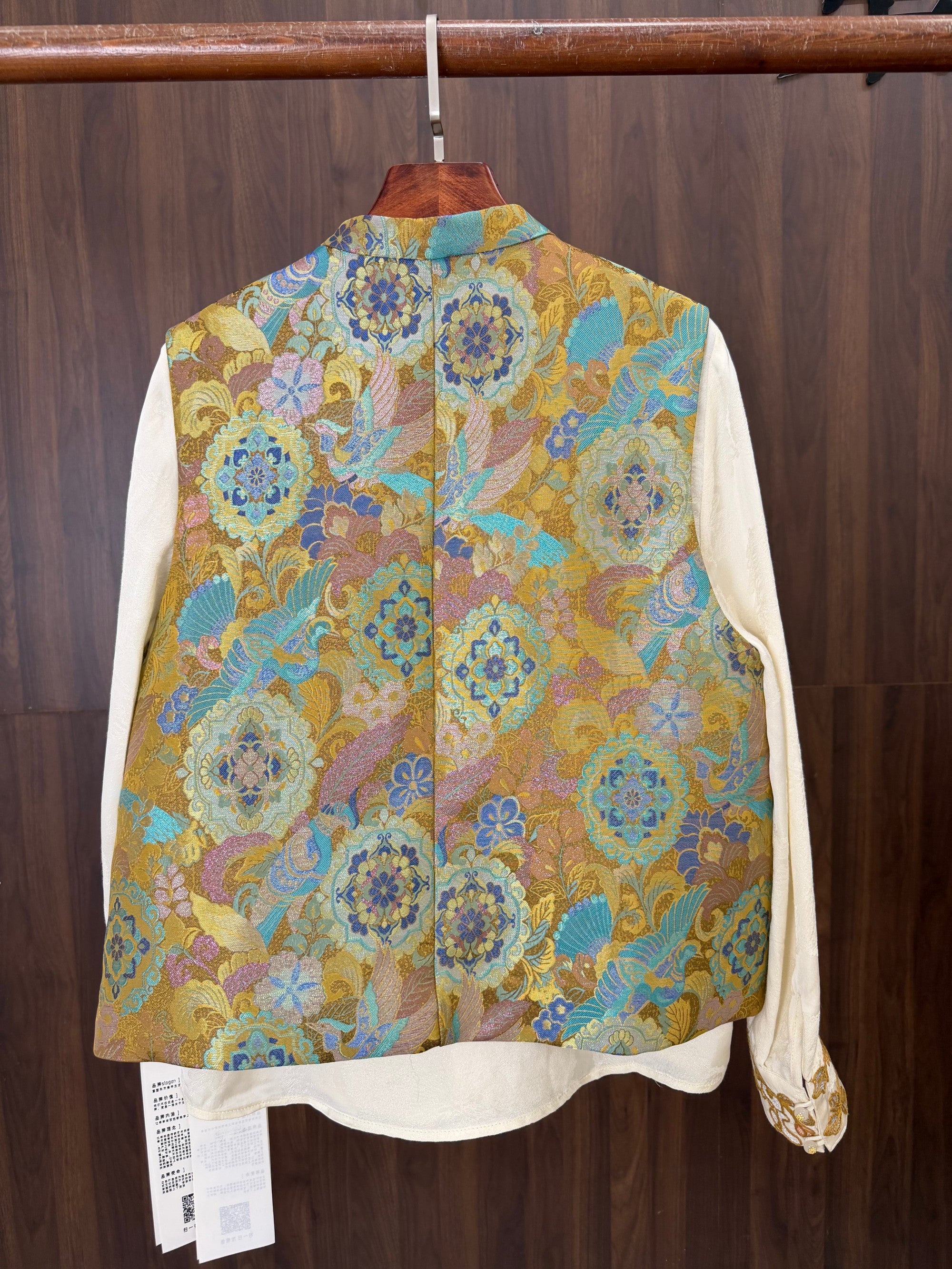 modern chinese fashion outfit styled with golden silk jacquard vest
