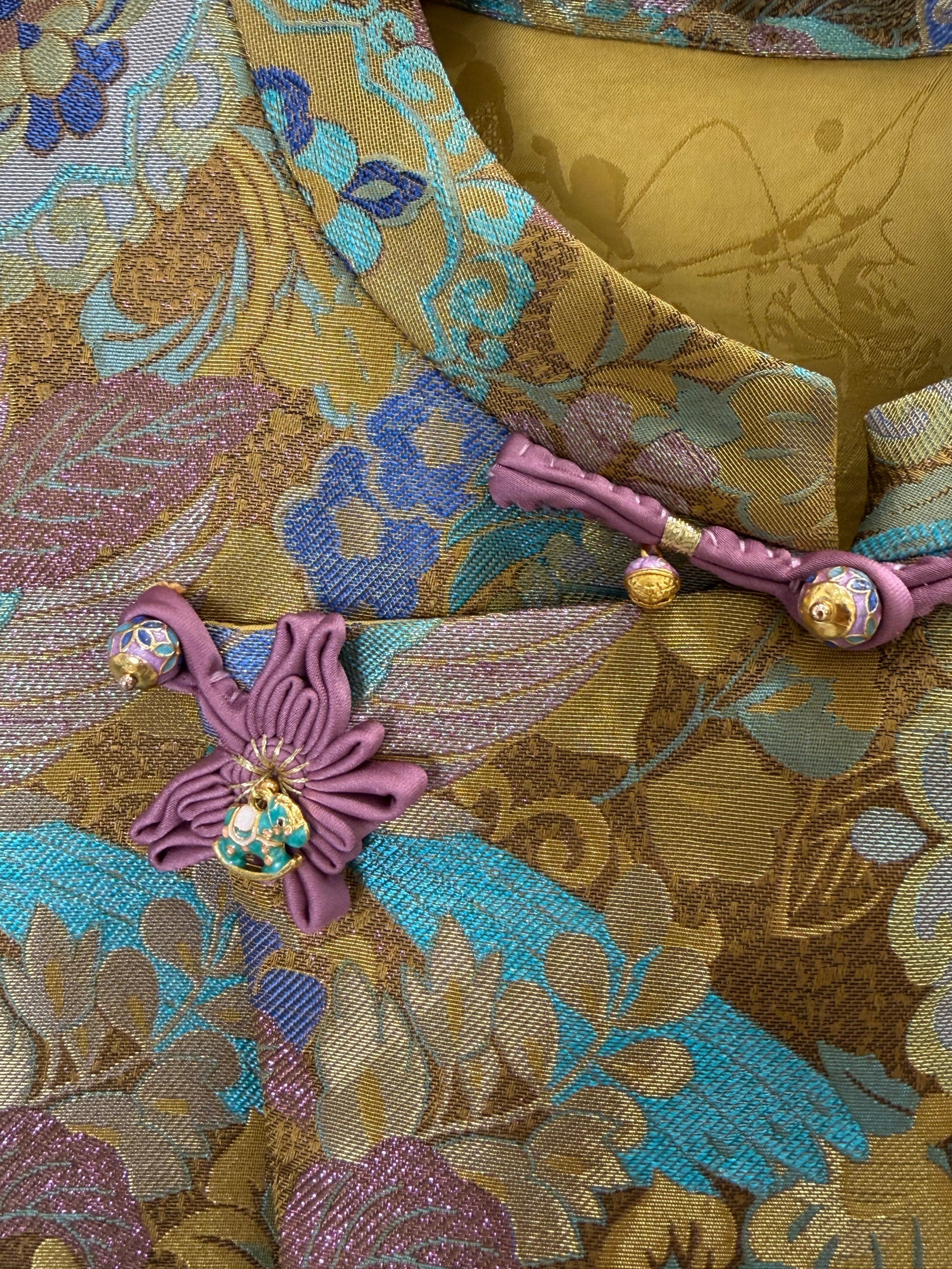 gold enamel jacquard mulberry silk fabric detail with auspicious bird pattern