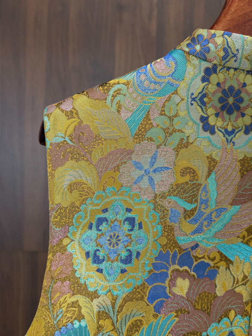 gold enamel jacquard mulberry silk fabric detail with auspicious bird pattern