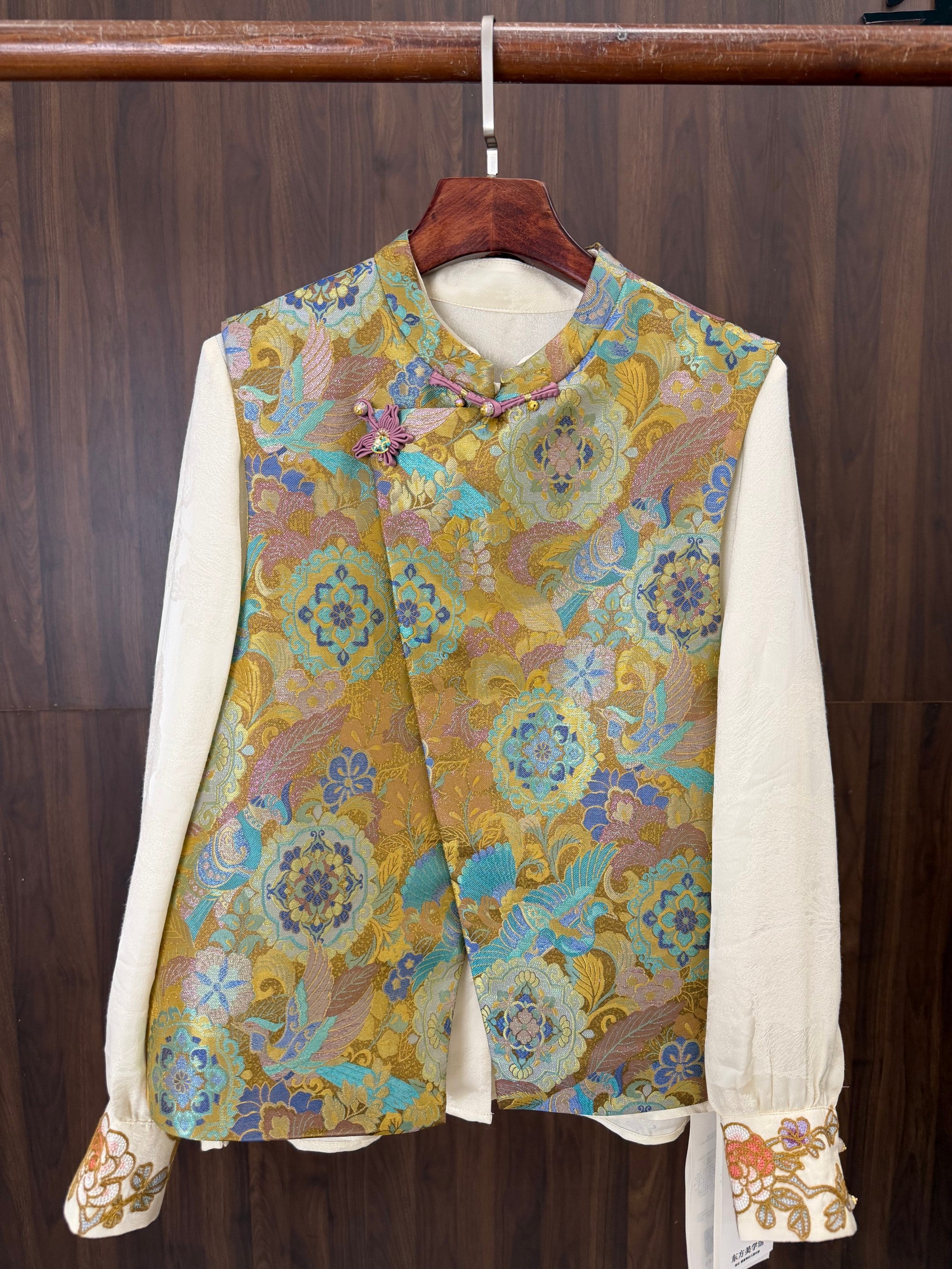 modern chinese fashion outfit styled with golden silk jacquard vest