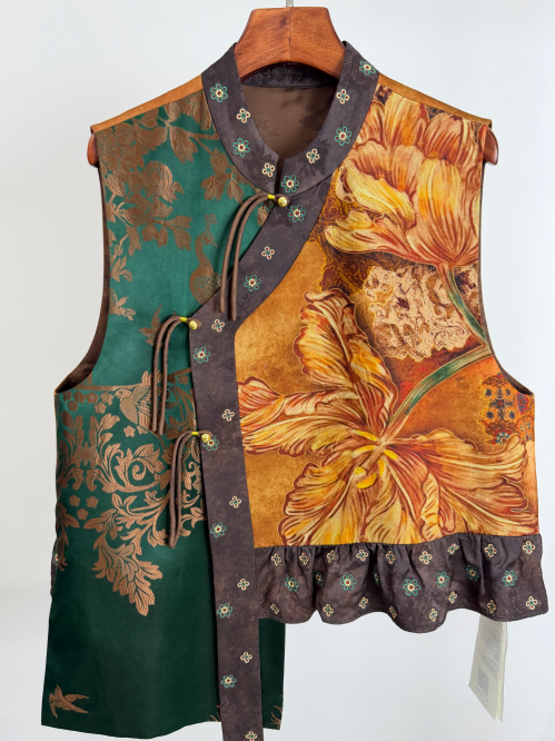 Floral patterned vest on a hanger against a white background