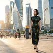 Lady in the Mulberry Silk Xiangyunsha Qipao walking in the urban street-Luxe Orienta
