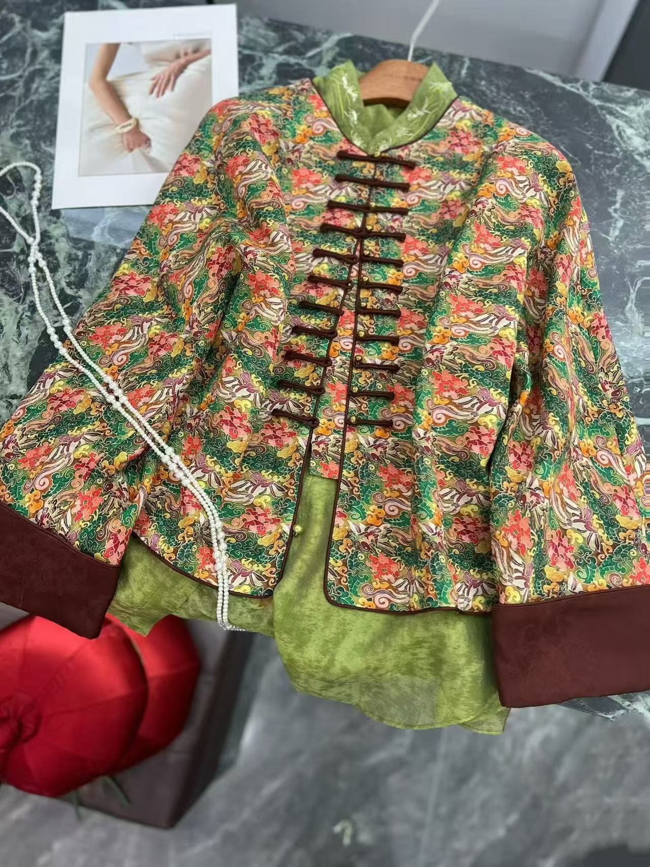 stying with a green blouse for the mulberry silk tang jacket