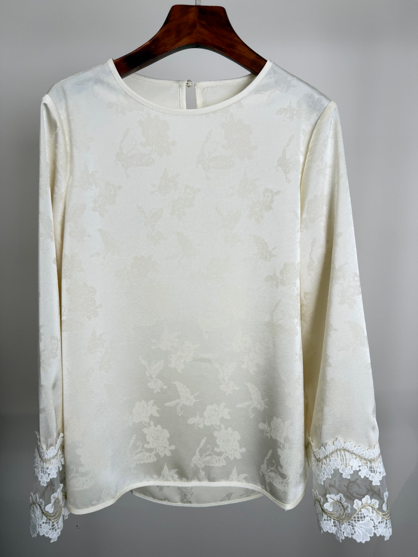 White tencel blouse in a hanger 